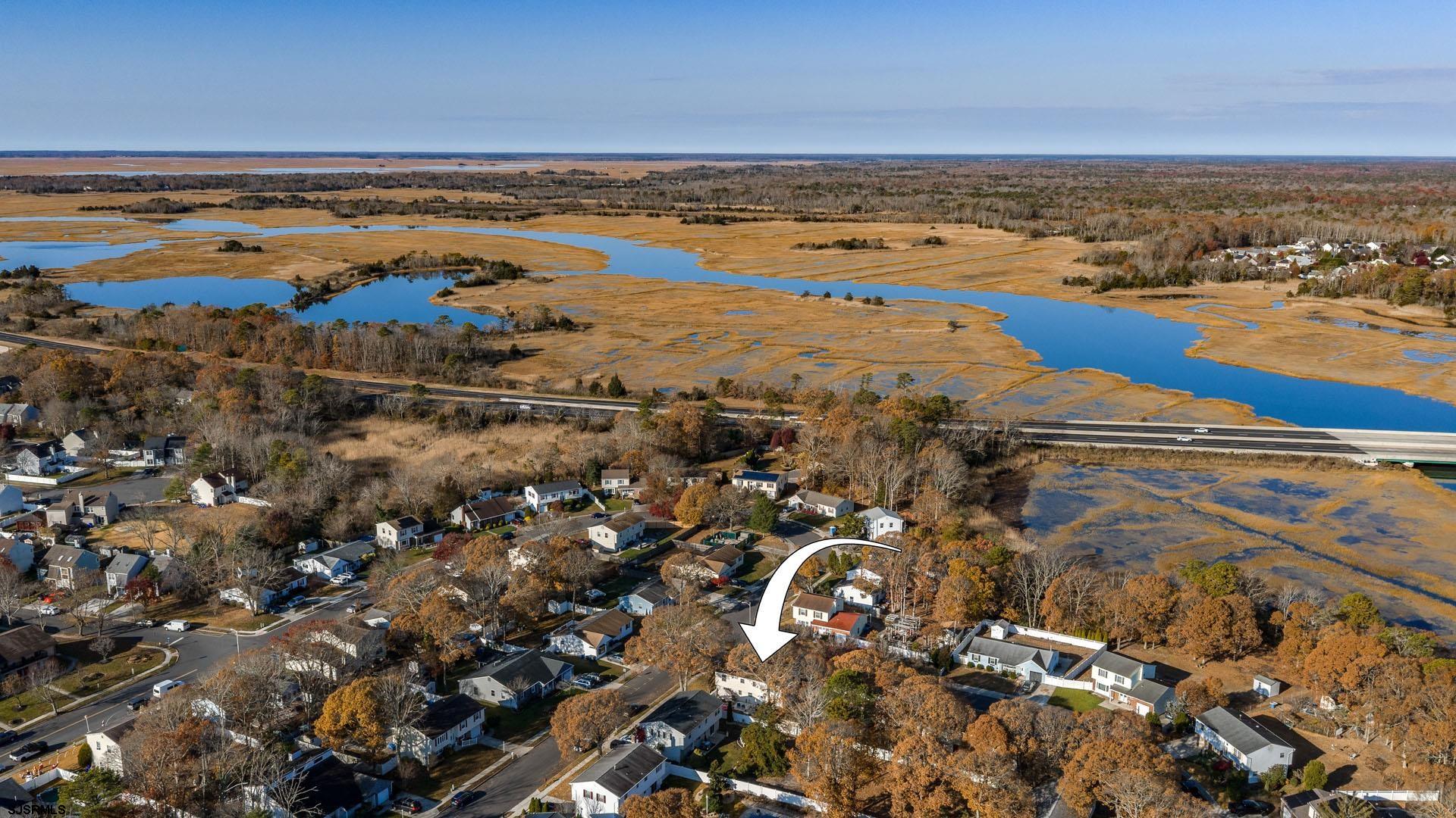 68 Defeo Lane Somers Point, NJ 08244 - Photo 50 of 51 a view of an ocean and beach
