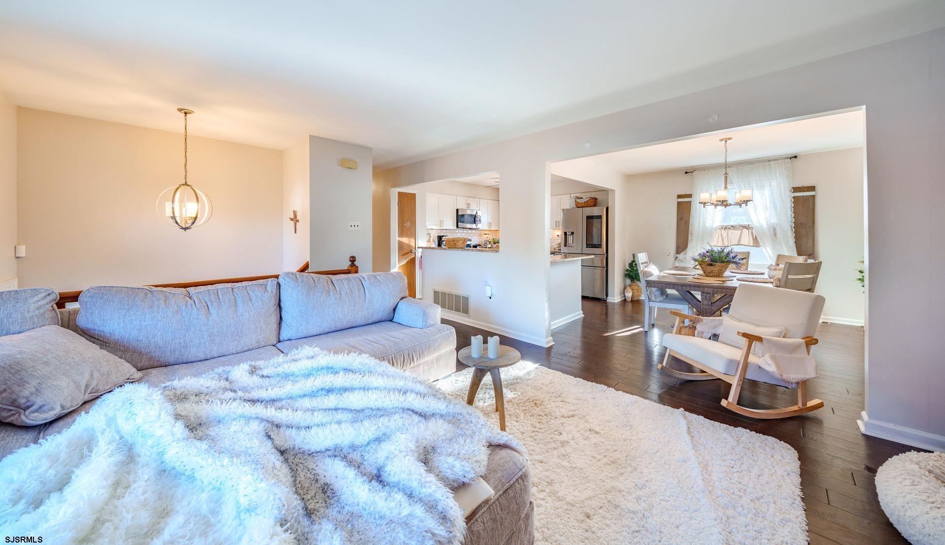 68 Defeo Lane Somers Point, NJ 08244 - Photo 6 of 51 a living room with furniture and a wooden floor