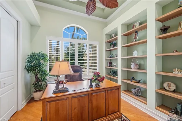 a room with furniture and a book shelf