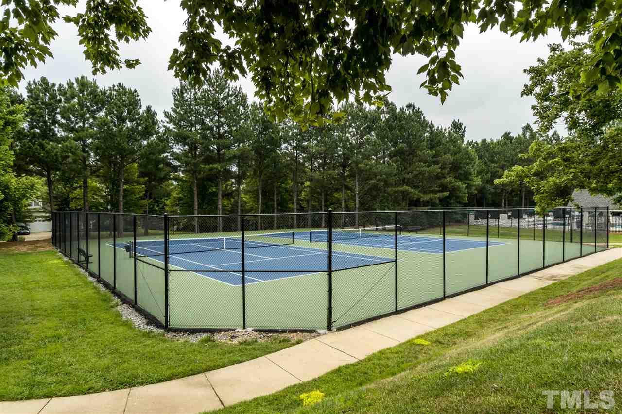 228 Mickleson Ridge Drive Raleigh, NC 27603 - Photo 25 of 25 a view of a backyard with fence
