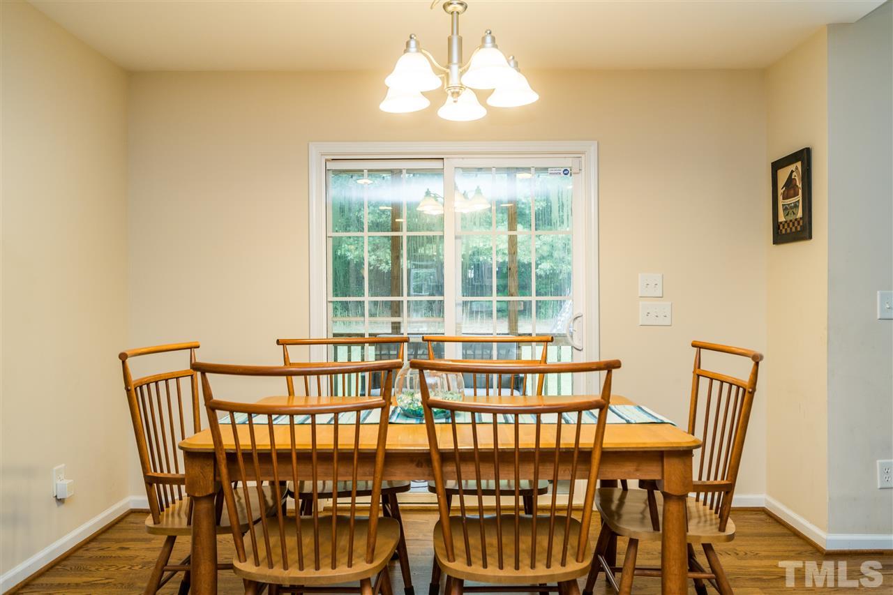 228 Mickleson Ridge Drive Raleigh, NC 27603 - Photo 8 of 25 a view of a chairs and table in the room