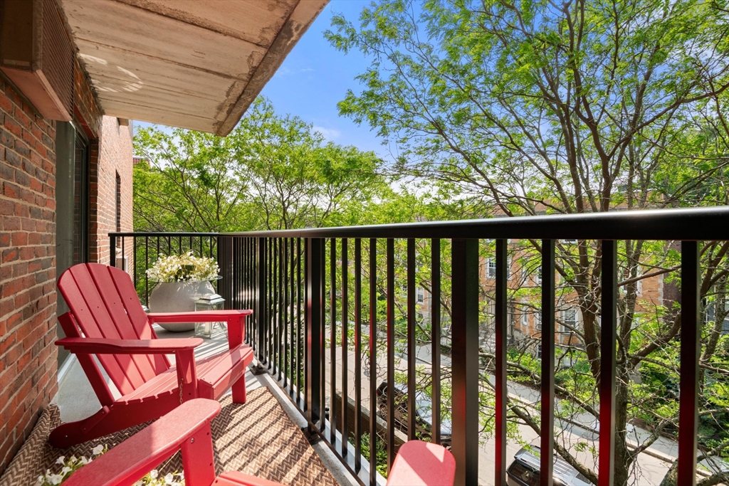 135 Pleasant Street, Unit 403 Brookline, MA 02446 - Photo 14 of 18 a view of a two chairs in the balcony