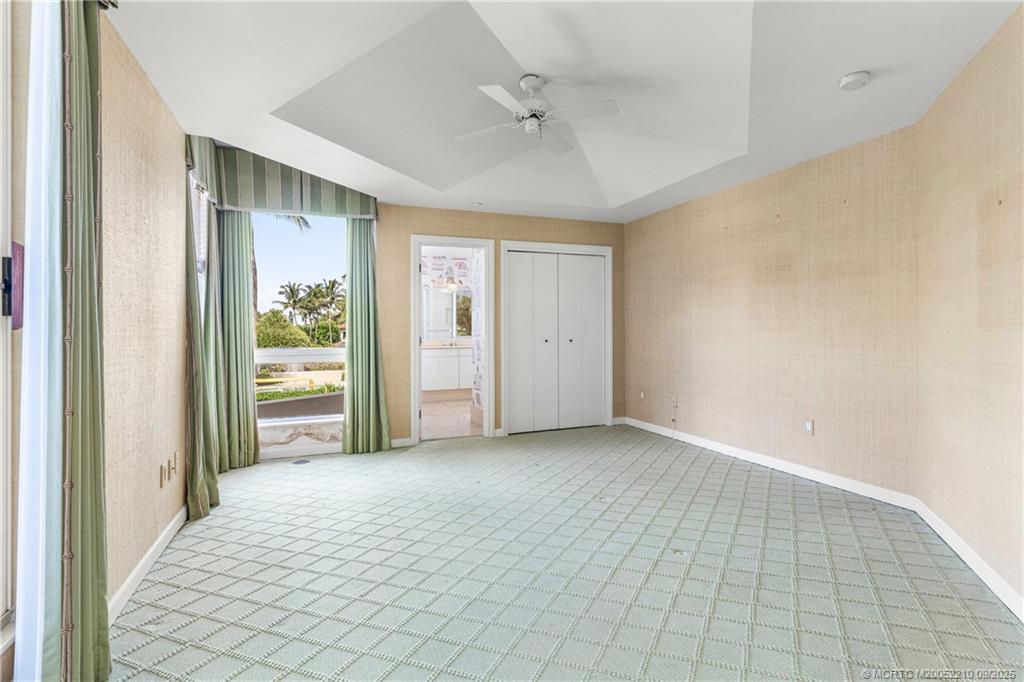3001 Southeast Island Point Lane, Unit 14 Stuart, FL 34996 - Photo 11 of 38 a view of a room with an empty room