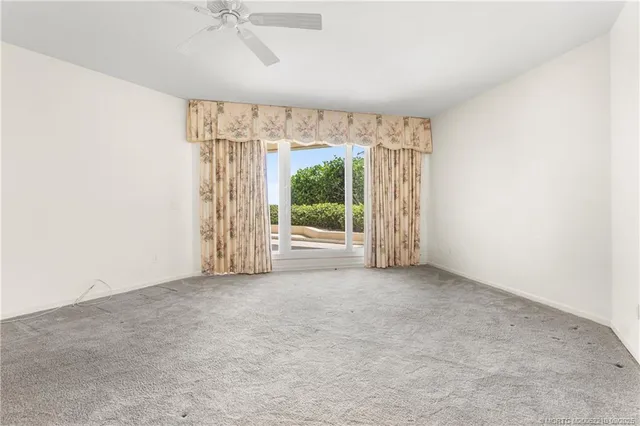 a large bathroom with a large tub sink and double vanity