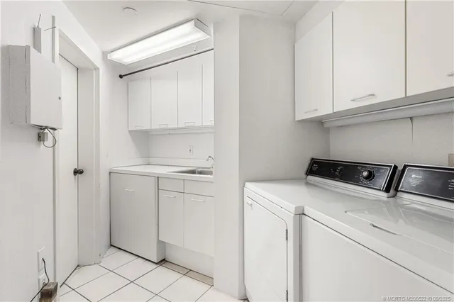 a balcony with view of an outdoor space