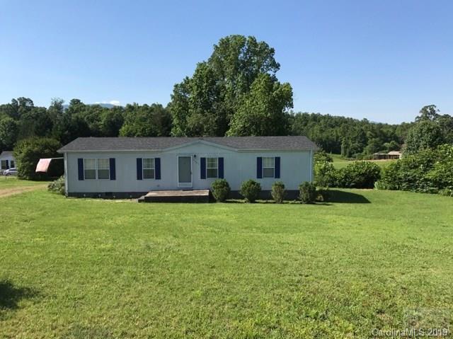 2281 Byrd Road Morganton, NC 28655 - Photo 1 of 12 a front view of a house with yard and green space