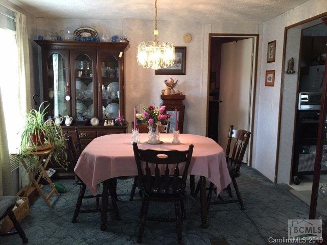 2281 Byrd Road Morganton, NC 28655 - Photo 2 of 12 a dining room with furniture and window