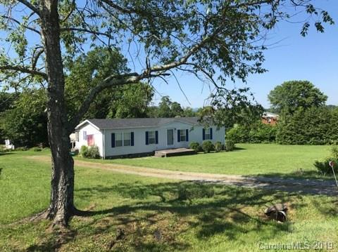 2281 Byrd Road Morganton, NC 28655 - Photo 11 of 12 a front view of a house with a yard and trees