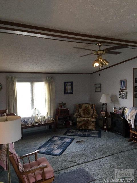 2281 Byrd Road Morganton, NC 28655 - Photo 3 of 12 a living room with furniture and a large window