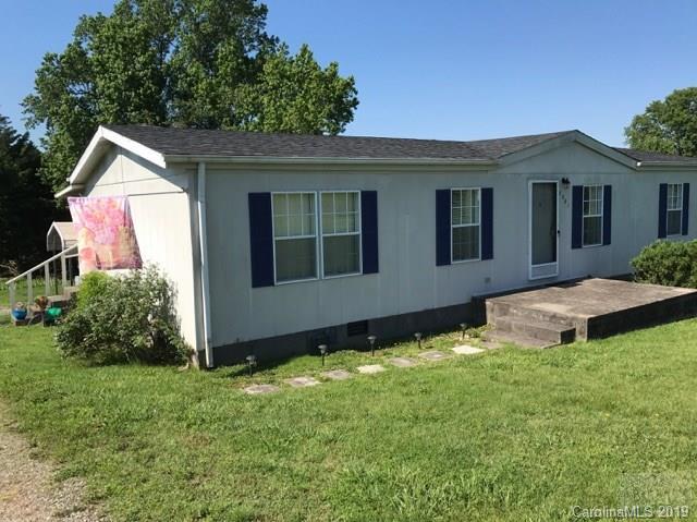2281 Byrd Road Morganton, NC 28655 - Photo 10 of 12 a front view of a house with a yard