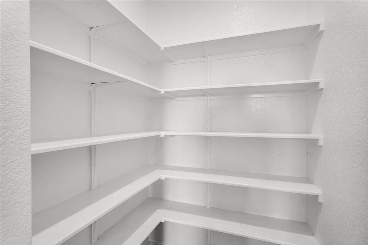 500 Stinchcomb Road Hutto, TX 78634 - Photo 21 of 37 Ample, well-organized shelving provides abundant storage for all culinary needs.