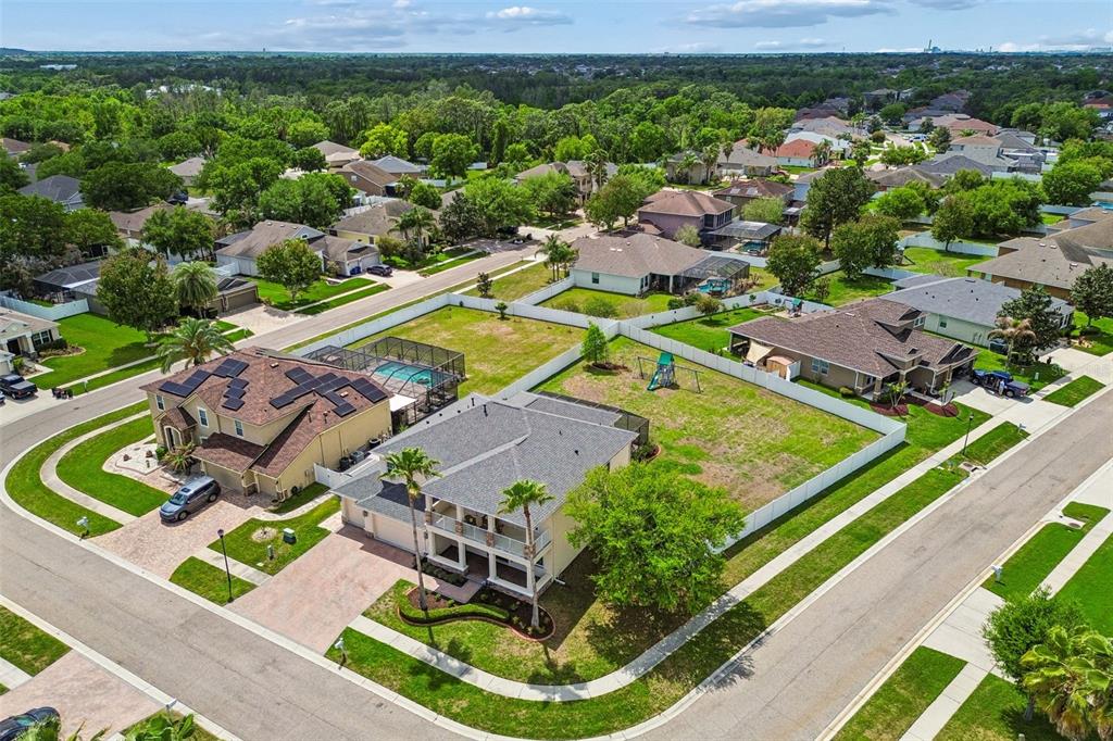 11830 Newberry Grove Loop Riverview, FL 33579 - Photo 55 of 58 an aerial view of a house with a garden