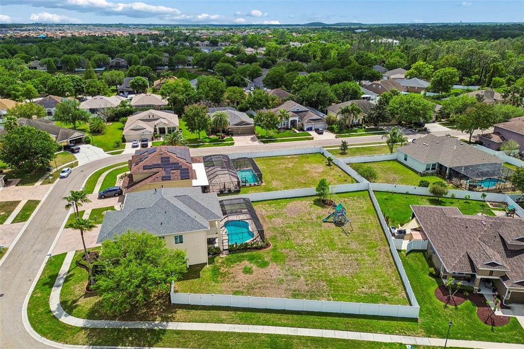 11830 Newberry Grove Loop Riverview, FL 33579 - Photo 56 of 58 an aerial view of residential houses with outdoor space and swimming pool