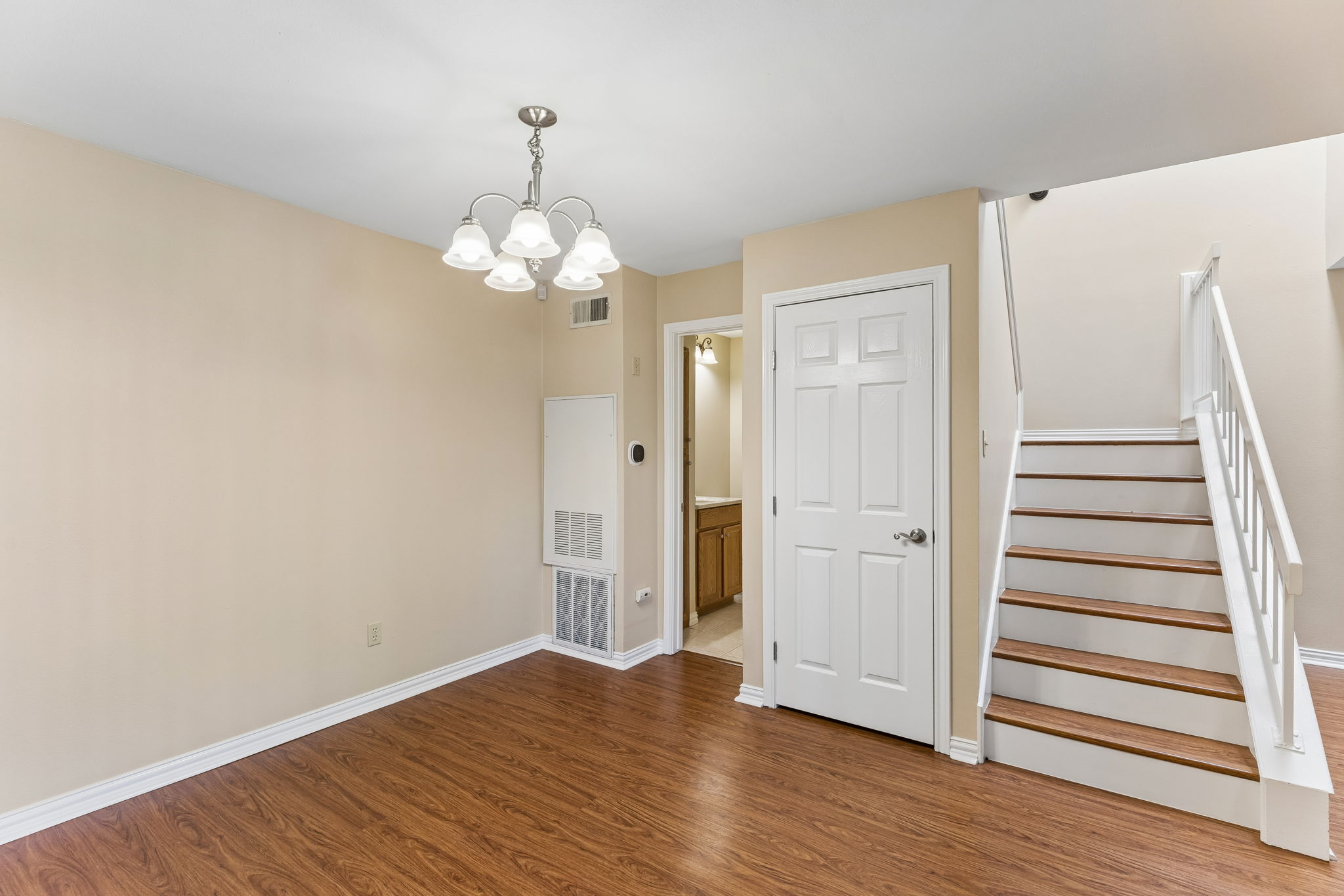 8340 Fathom Circle, Unit 103 Austin, TX 78750 - Photo 12 of 30 a view of a room with wooden floor