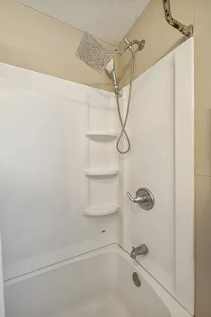 a bathroom with a sink toilet and a mirror