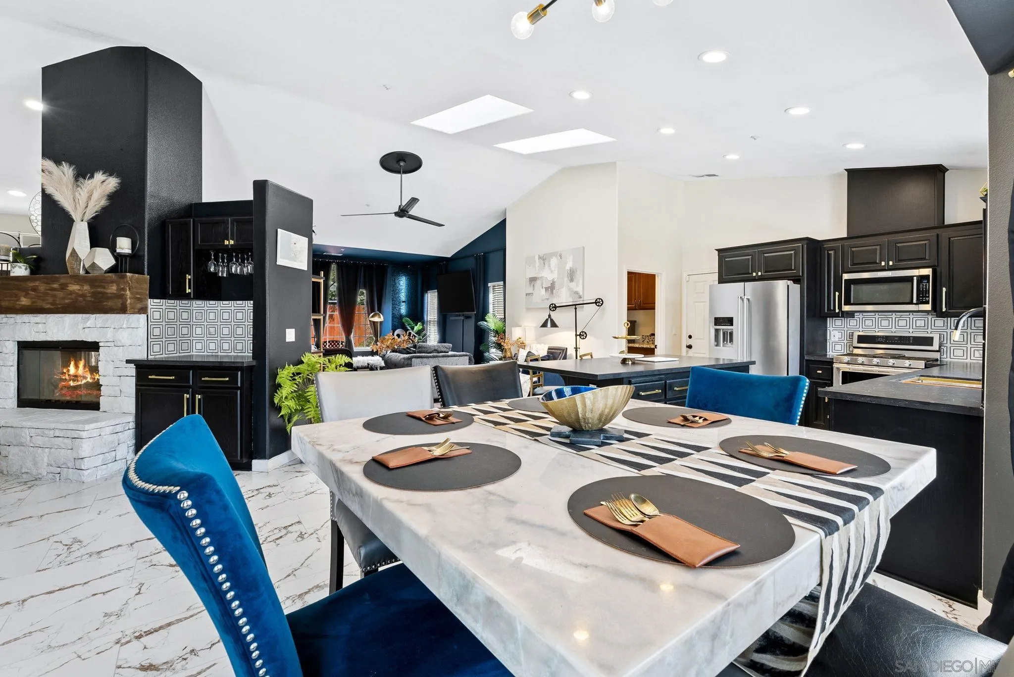 624 Rowley Way Ramona, CA 92065 - Photo 19 of 54 a dining room with furniture and a fireplace