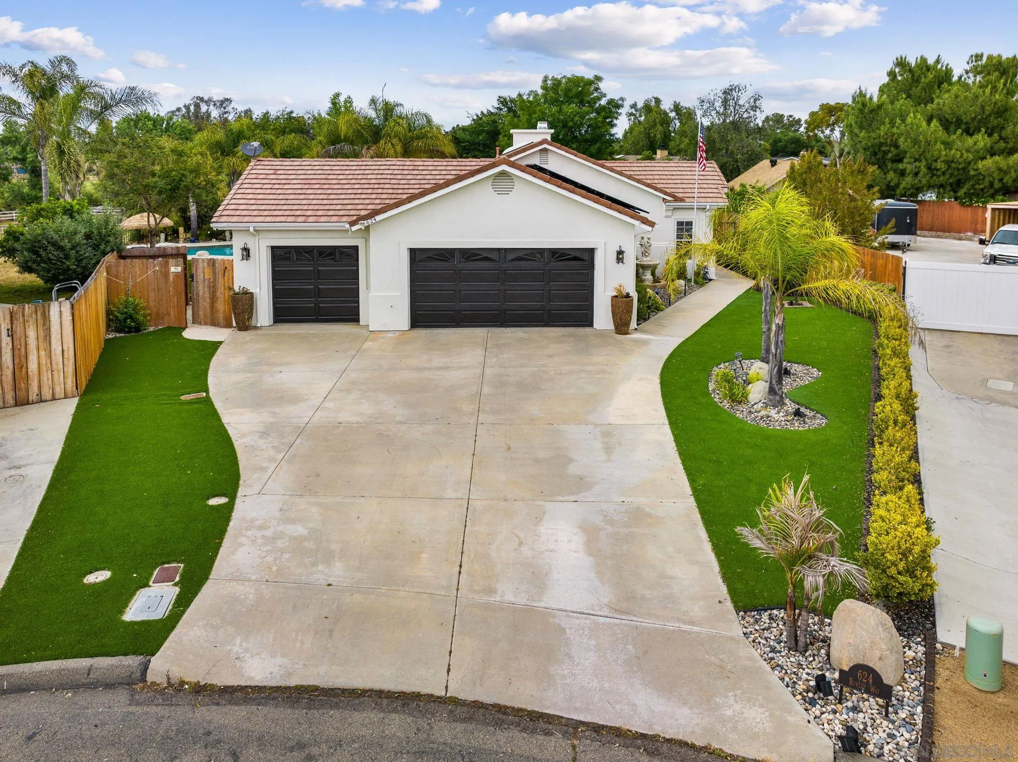 624 Rowley Way Ramona, CA 92065 - Photo 2 of 54 a front view of a house with garden