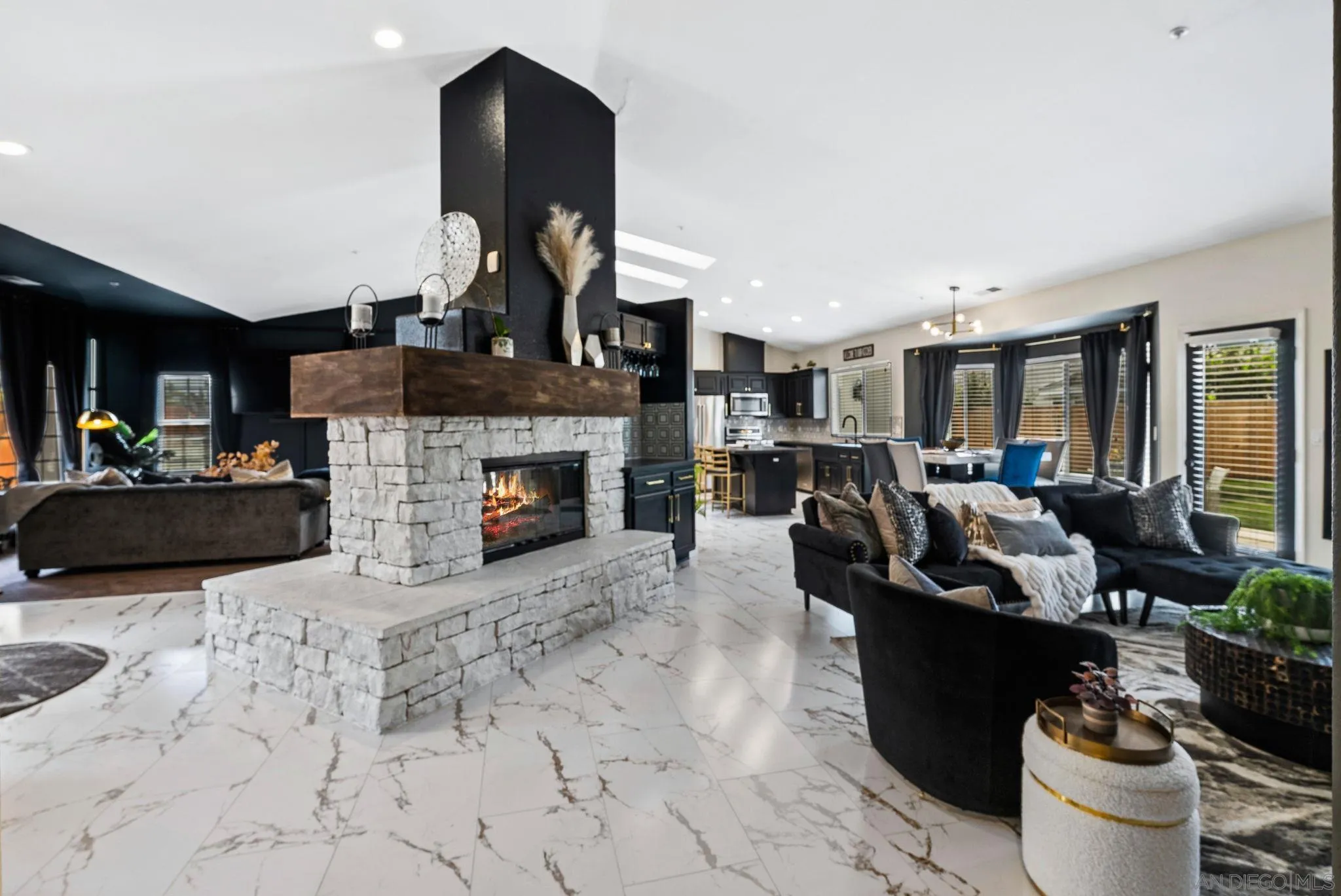 624 Rowley Way Ramona, CA 92065 - Photo 22 of 54 a living room with furniture a fireplace and a flat screen tv
