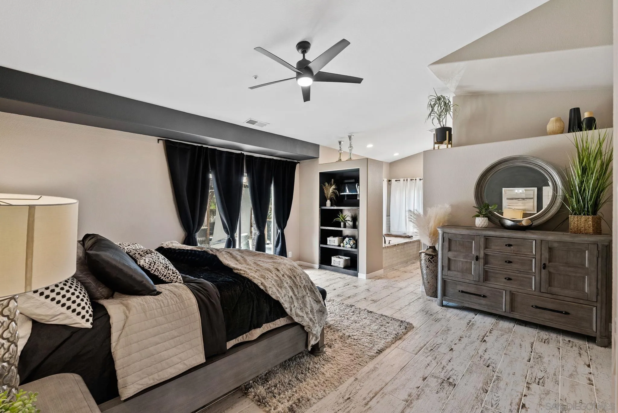 624 Rowley Way Ramona, CA 92065 - Photo 31 of 54 a bedroom with a large bed and a window