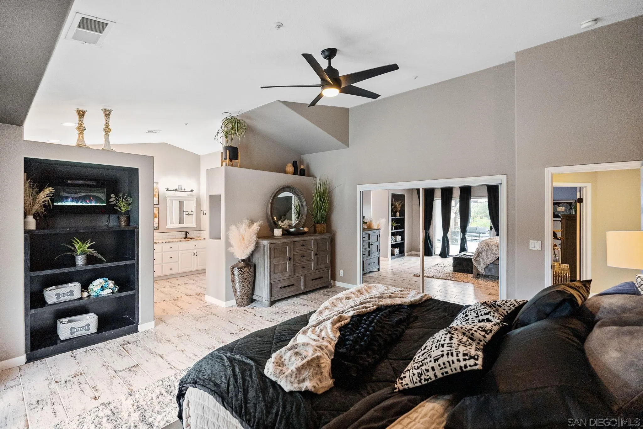 624 Rowley Way Ramona, CA 92065 - Photo 32 of 54 a bed room with a bed a couch and dresser