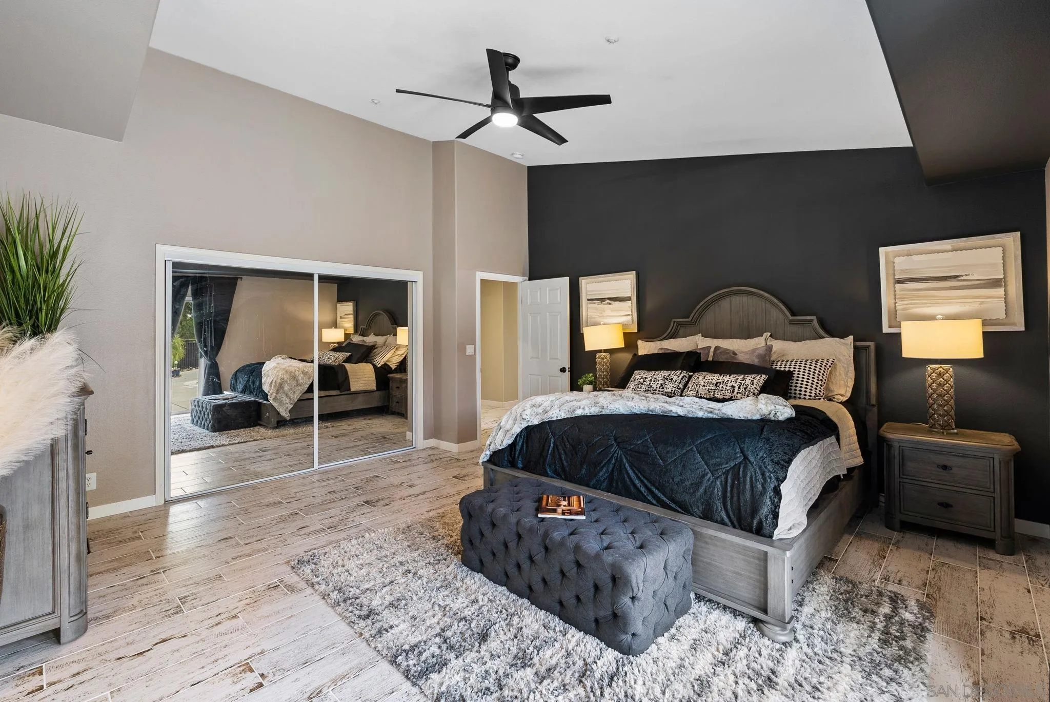 624 Rowley Way Ramona, CA 92065 - Photo 33 of 54 a living room with furniture a ceiling fan and a rug