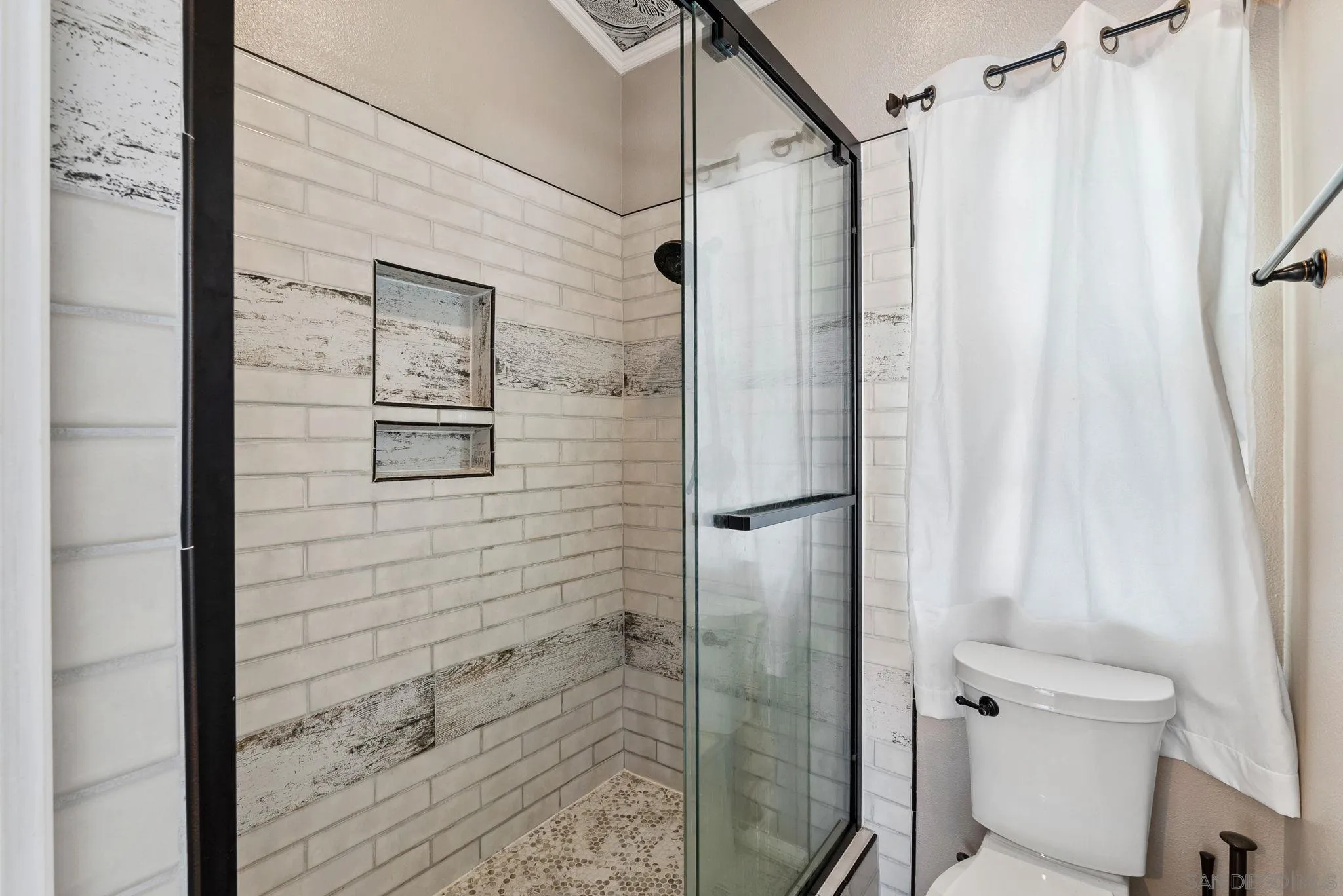 624 Rowley Way Ramona, CA 92065 - Photo 35 of 54 a bathroom with a shower and a toilet