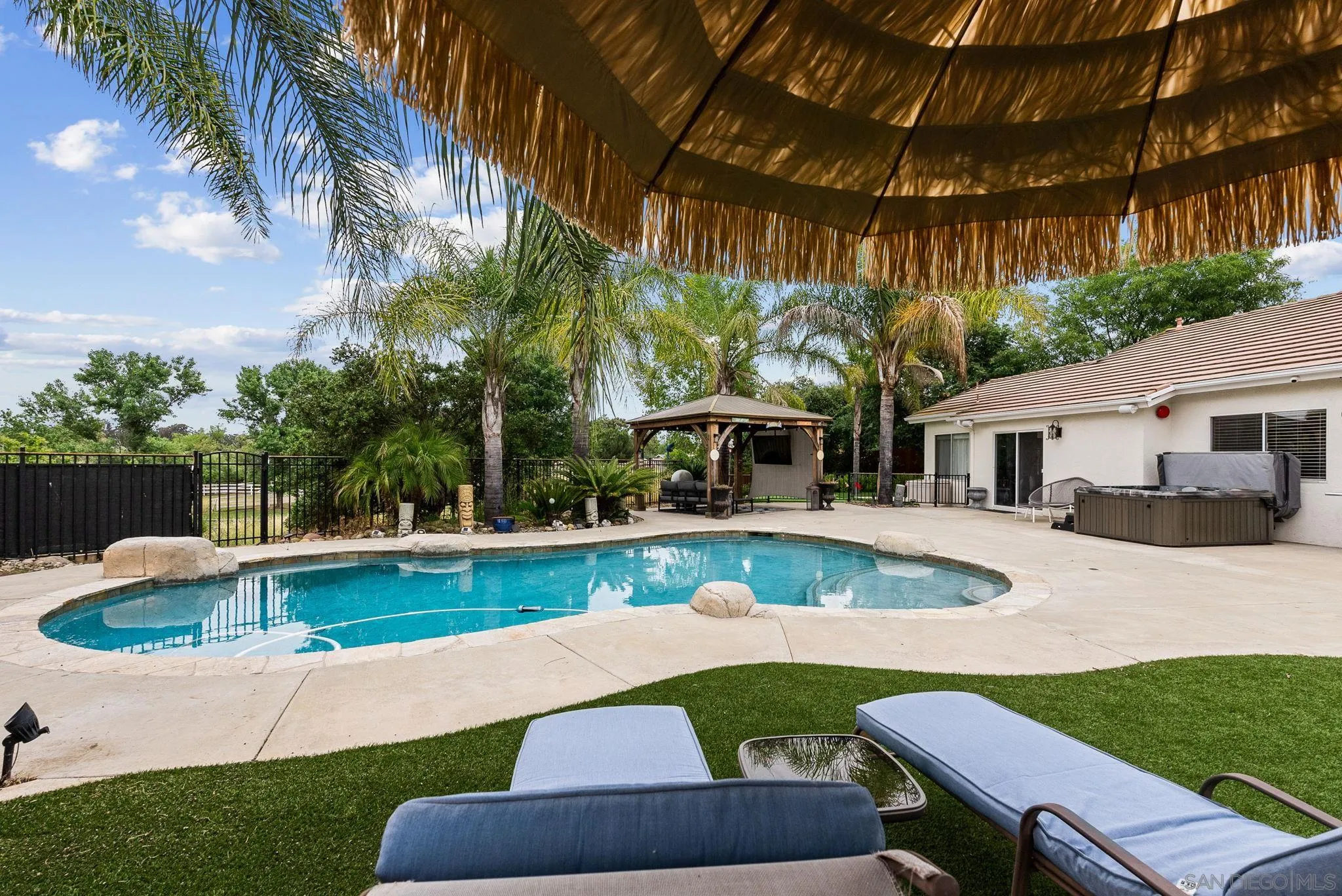 624 Rowley Way Ramona, CA 92065 - Photo 43 of 54 a view of house with swimming pool and a yard
