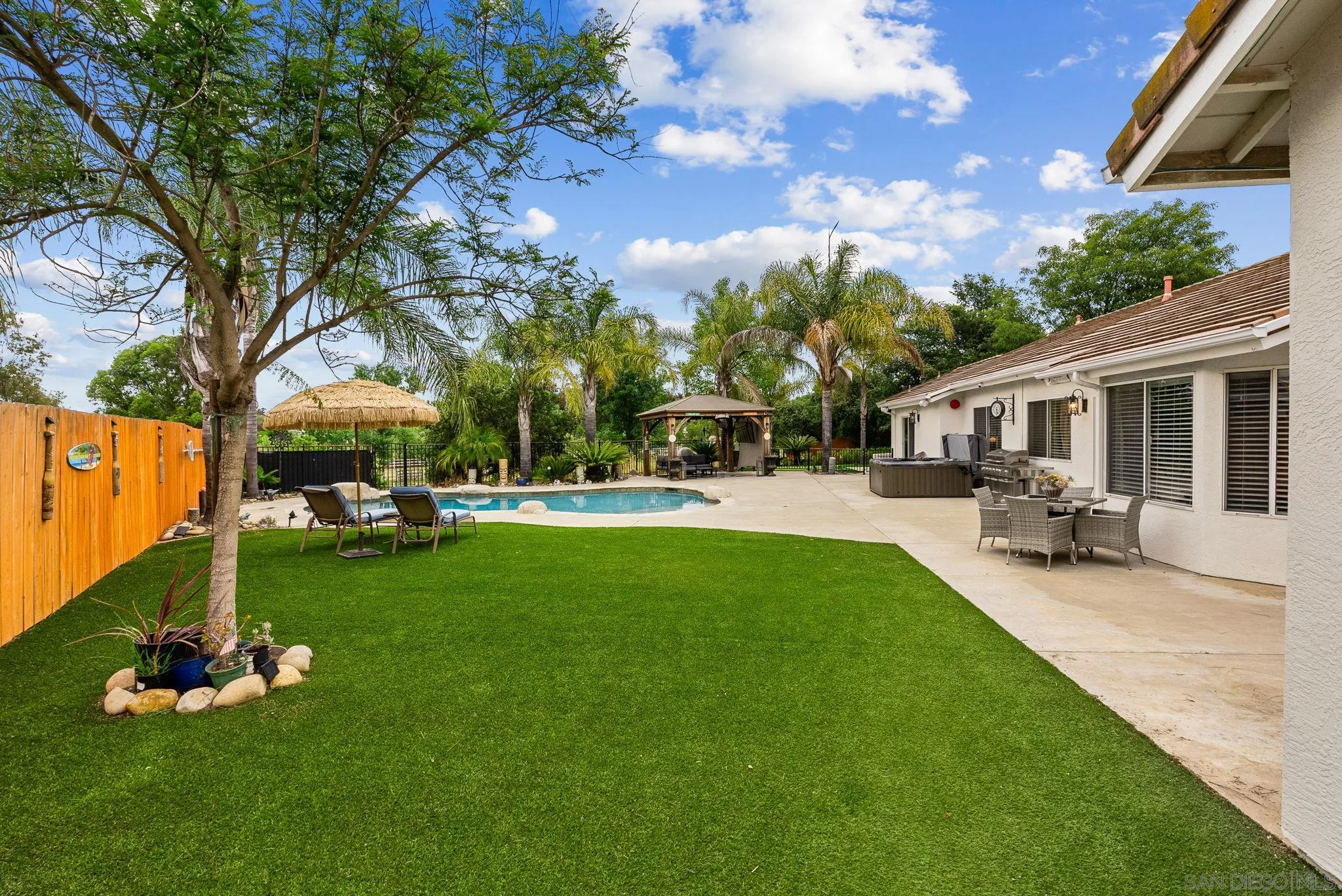 624 Rowley Way Ramona, CA 92065 - Photo 44 of 54 a view of a house with backyard