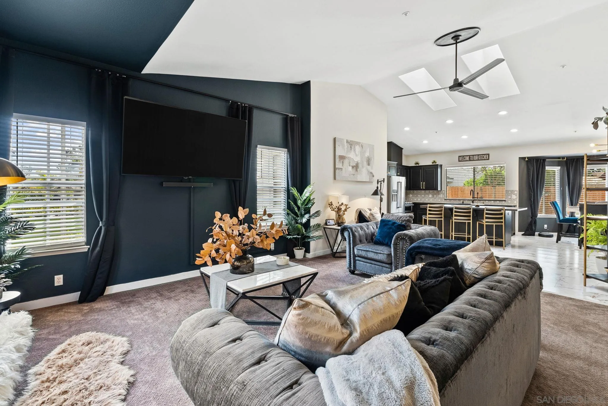 624 Rowley Way Ramona, CA 92065 - Photo 9 of 54 a living room with furniture and a flat screen tv