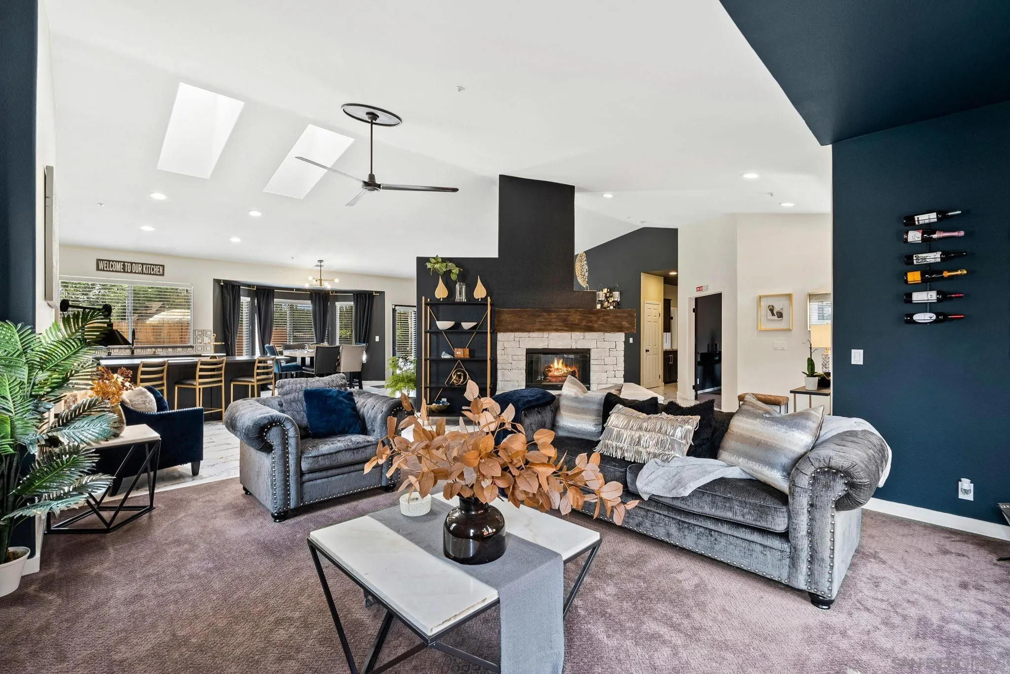 624 Rowley Way Ramona, CA 92065 - Photo 10 of 54 a living room with fireplace furniture and a wooden floor