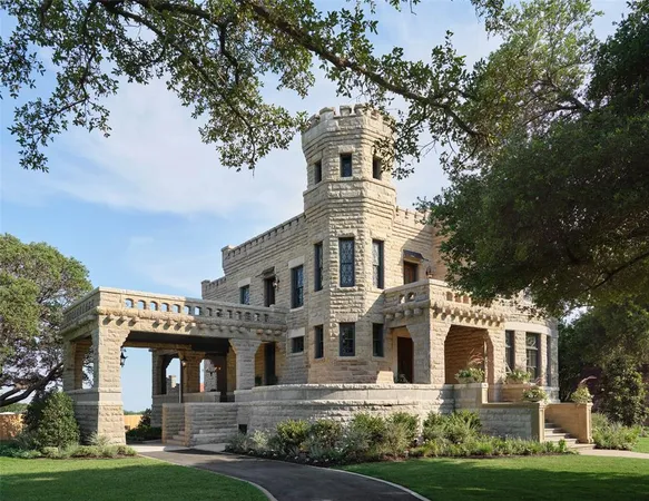 front view of a building with a garden