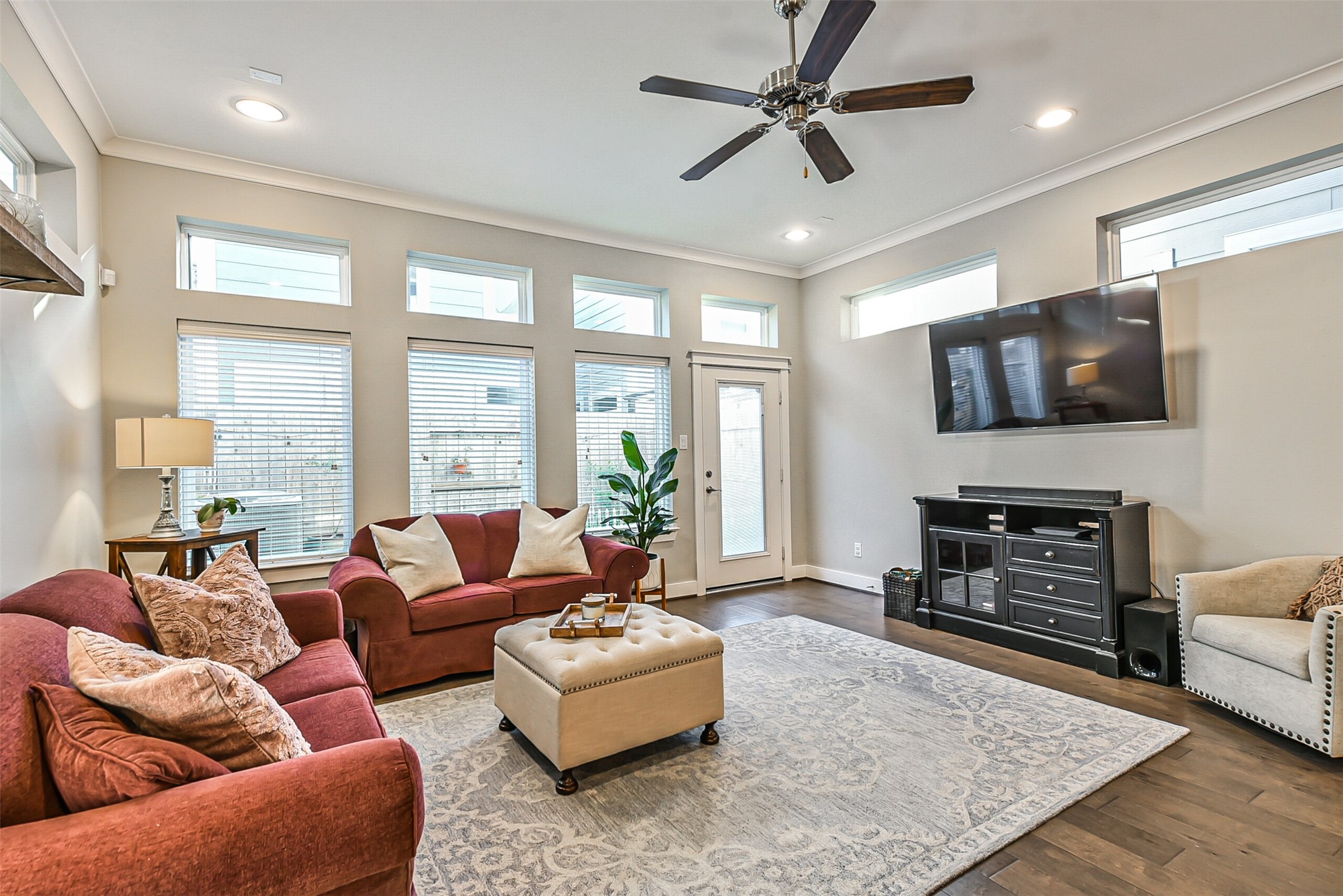 3222 Gillespie Street Houston, TX 77020 - Photo 14 of 43 a living room with fireplace furniture and a flat screen tv