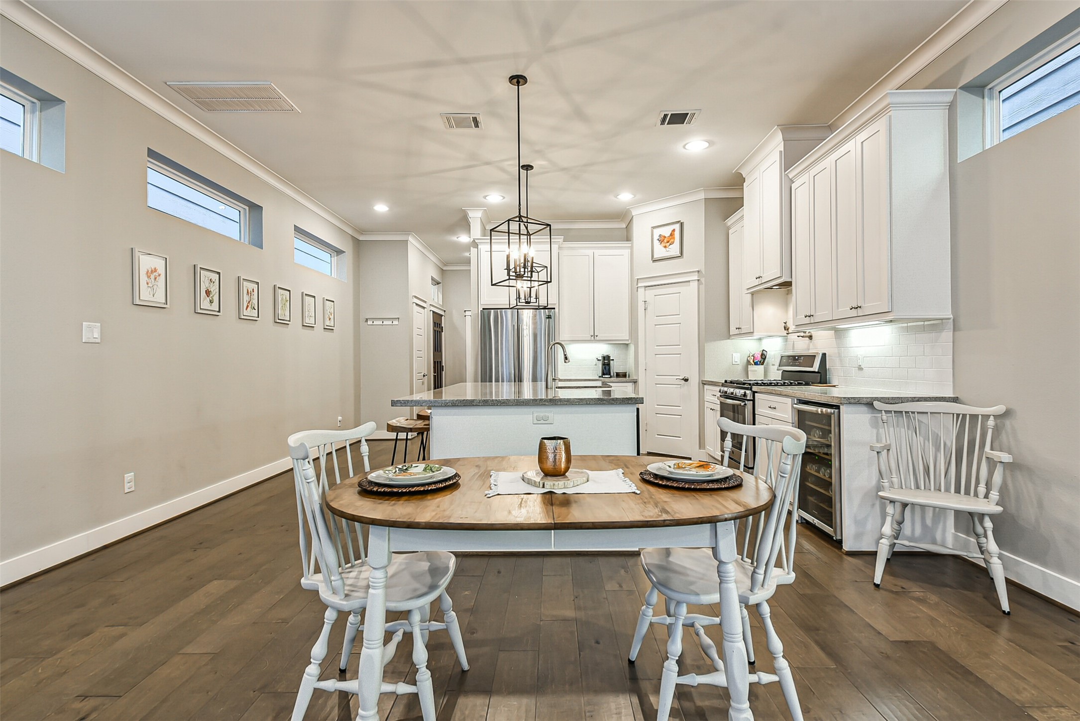 3222 Gillespie Street Houston, TX 77020 - Photo 16 of 43 a view of a dining room with furniture window and wooden floor