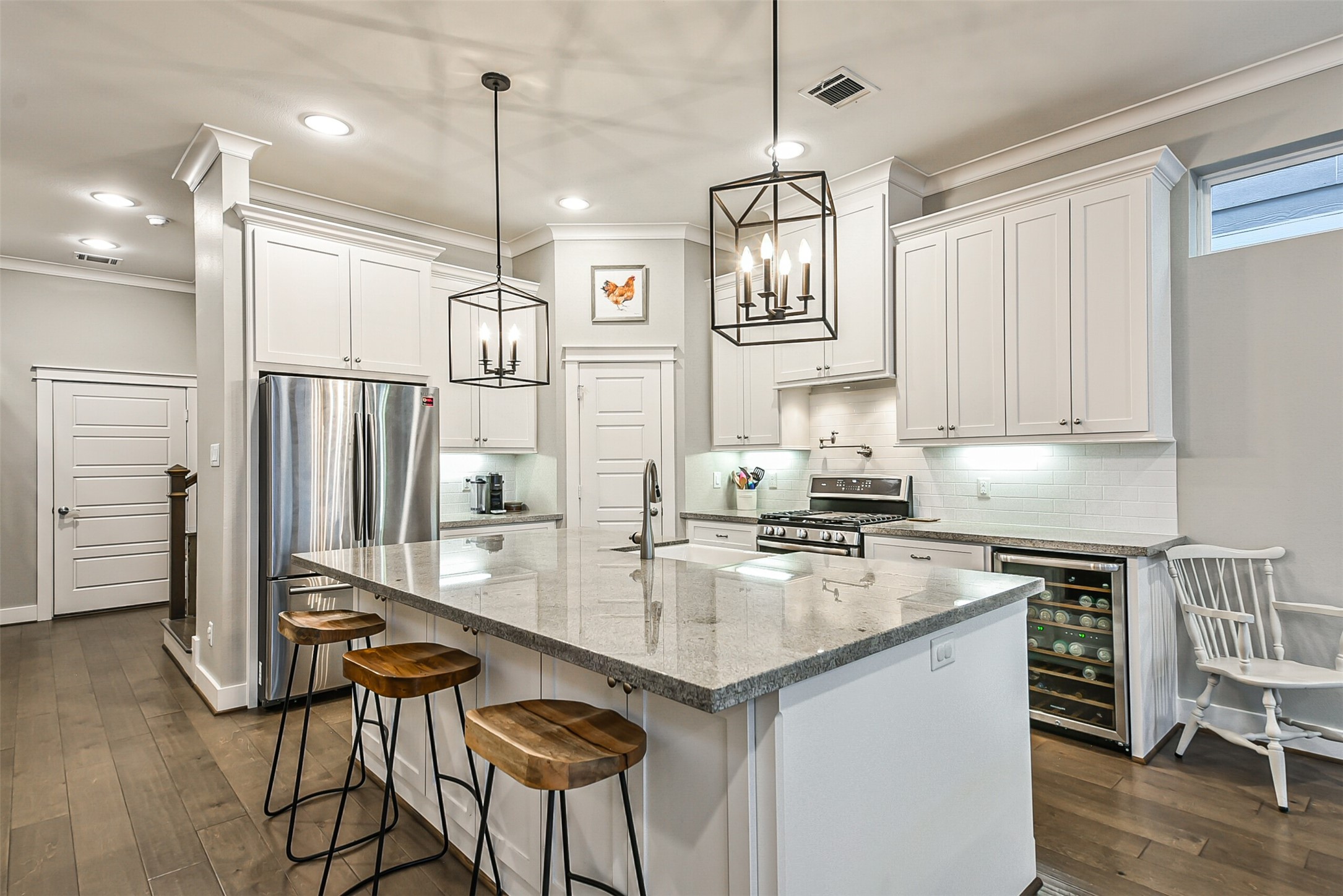 3222 Gillespie Street Houston, TX 77020 - Photo 18 of 43 a kitchen with stainless steel appliances granite countertop a sink refrigerator and cabinets
