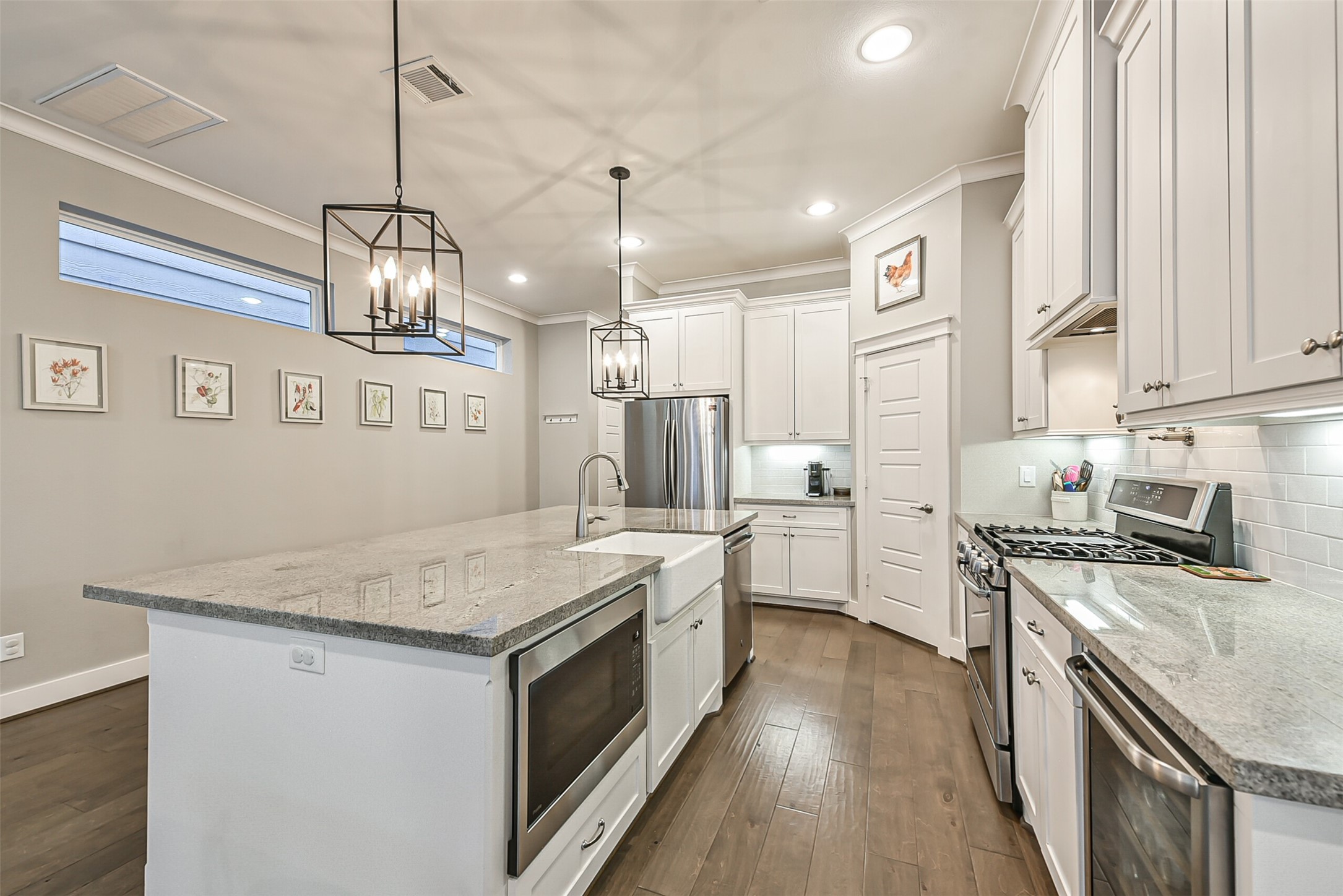 3222 Gillespie Street Houston, TX 77020 - Photo 25 of 43 a kitchen with granite countertop a sink a counter space appliances and cabinets