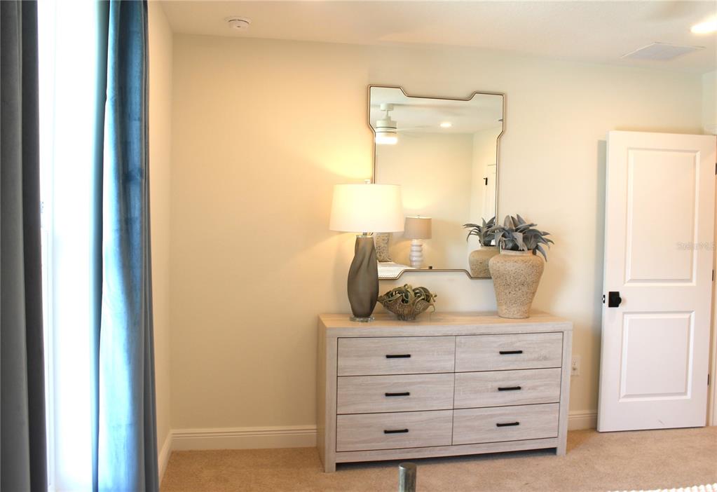 17724 Broadleaf Loop Venice, FL 34293 - Photo 11 of 19 a bathroom with a sink and a mirror