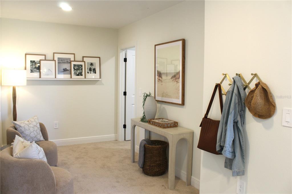 17724 Broadleaf Loop Venice, FL 34293 - Photo 13 of 19 a view of walk in closet with clothes and shoes