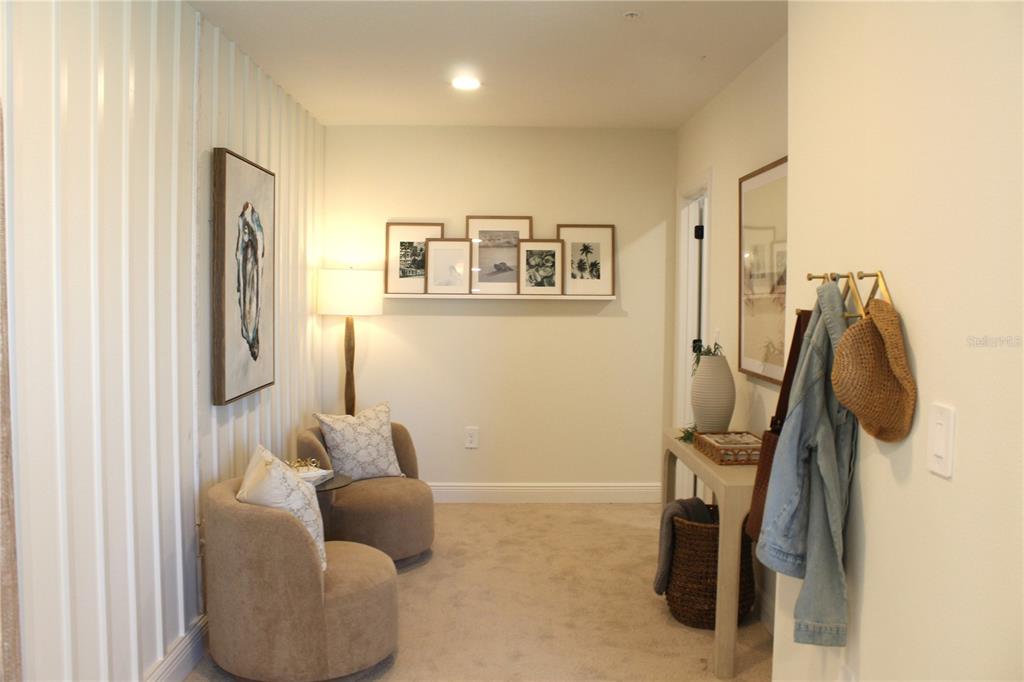 17724 Broadleaf Loop Venice, FL 34293 - Photo 14 of 19 a living room with furniture and a window