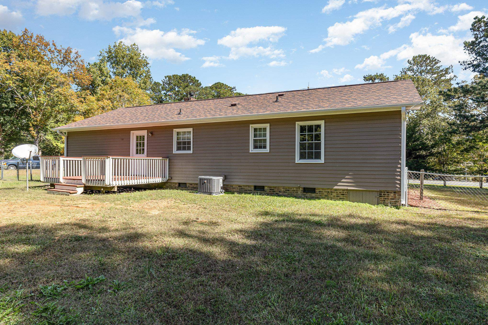 8724 Walter Myatt Road Willow Spring, NC 27592 - Photo 23 of 24 a front view of a house with a yard