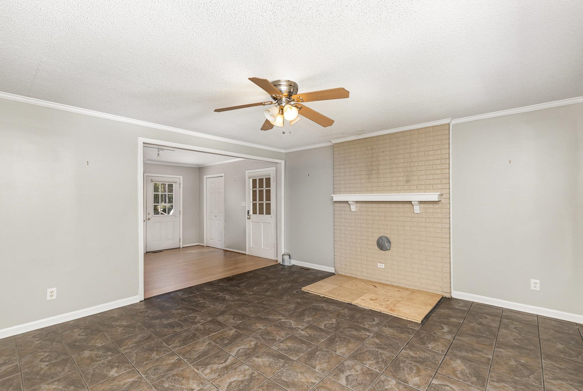 8724 Walter Myatt Road Willow Spring, NC 27592 - Photo 4 of 24 an empty room with closet and windows