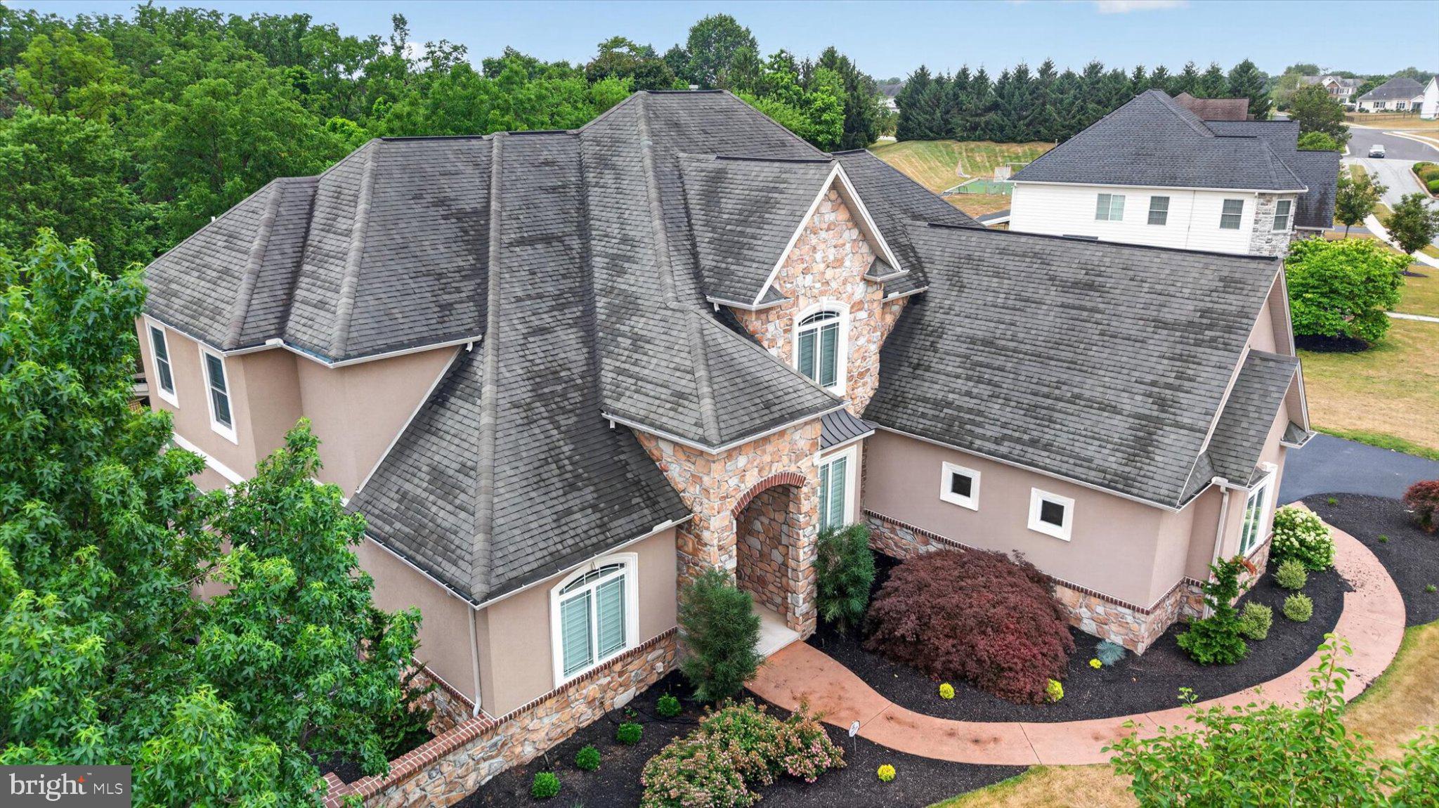 6505 Plowman Ridge Harrisburg, PA 17112 - Photo 68 of 83 Elegant home with lush landscaping.