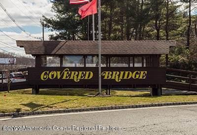 102 Arrowood Road, Unit A Manalapan, NJ 07726 - Photo 11 of 11 a view of sign board