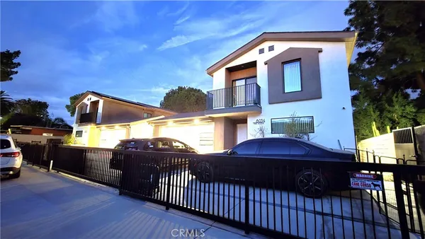 a front view of a house with patio