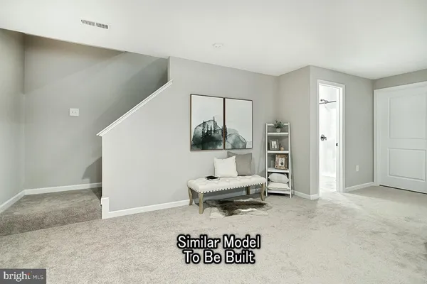 a living room with a couch