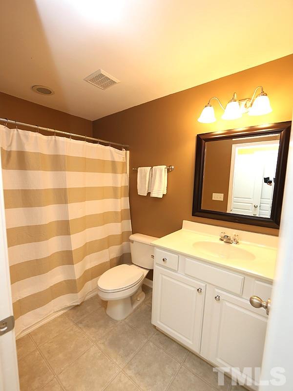 7702 Winners Edge Street Raleigh, NC 27617 - Photo 14 of 18 Full bath in the second master/second bedroom