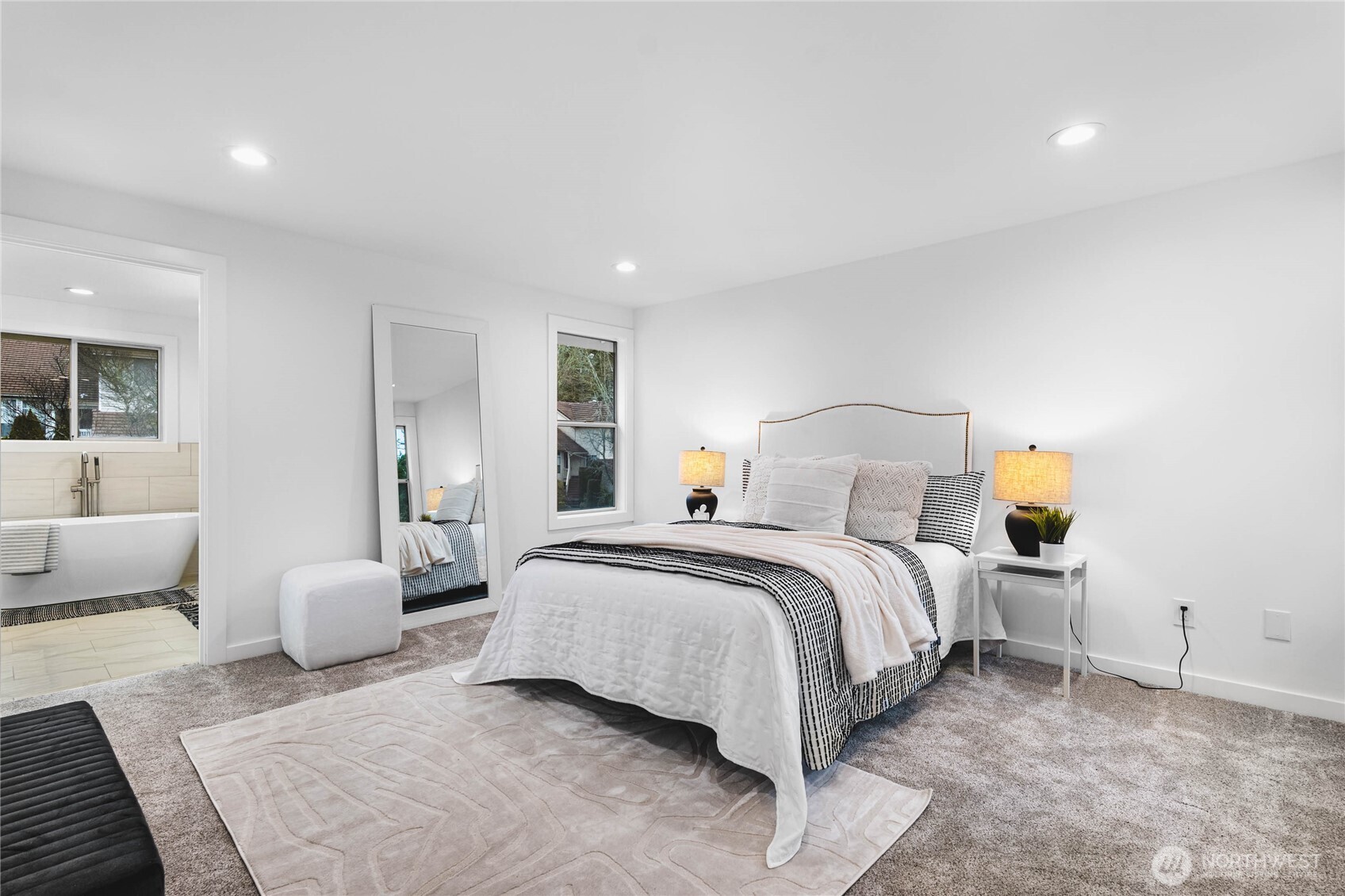 17431 Northeast 28th Street Redmond, WA 98052 - Photo 11 of 32 a bedroom with a bed and couch