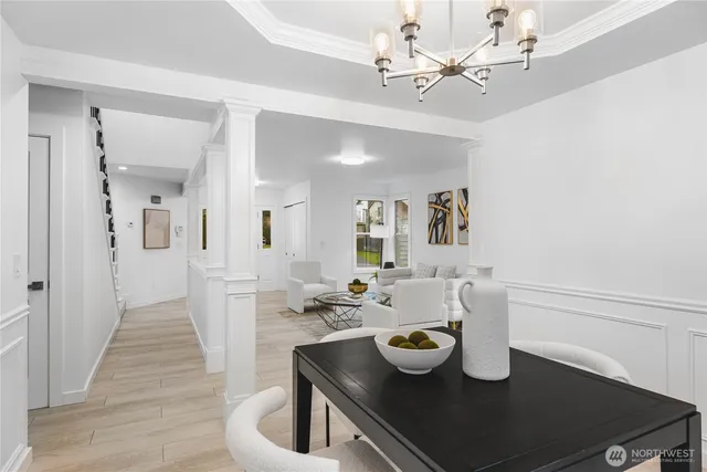 a dining room with wooden floor