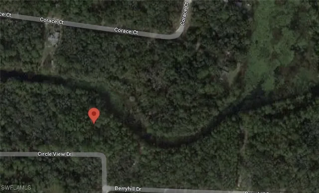 a view of a street with a trees