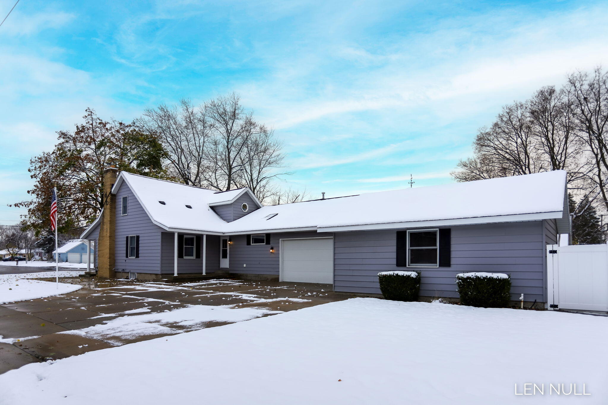 885 Baldwin Street Jenison, MI 49428 - Photo 3 of 41 3 East side of Home