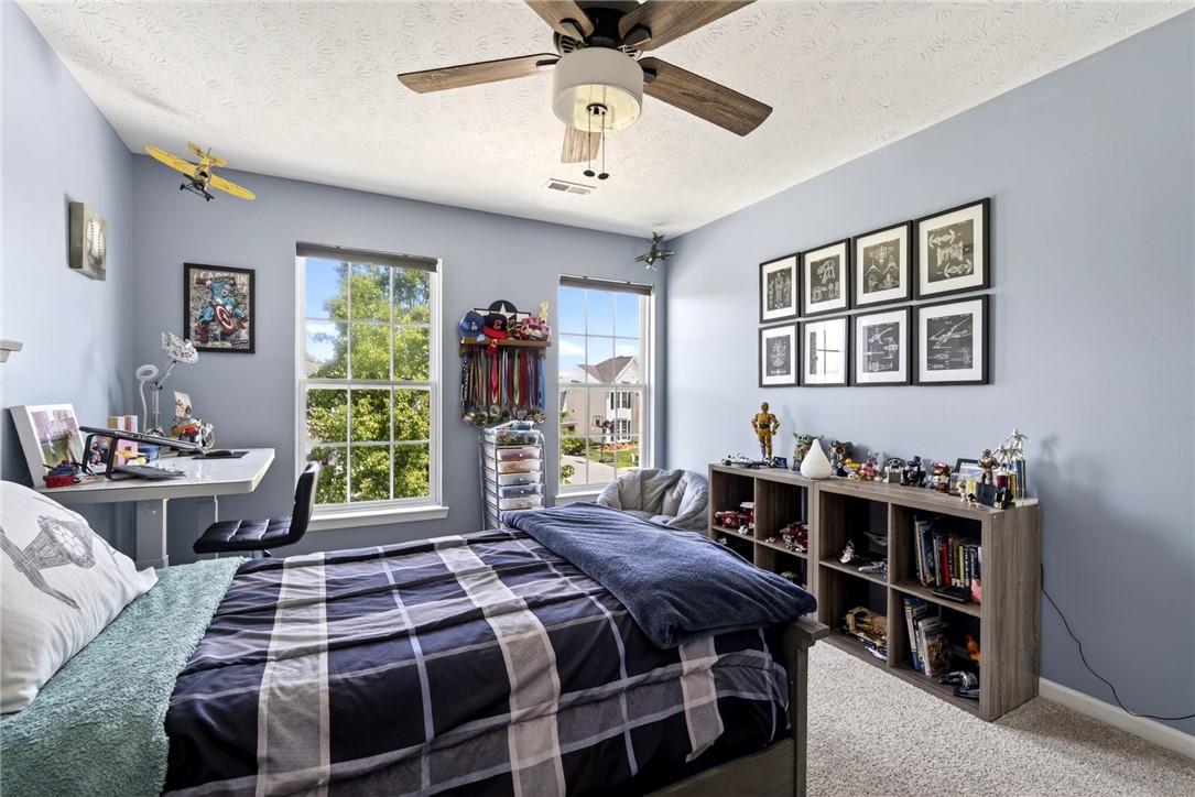39 Holly Court Springboro, OH 45066 - Photo 26 of 42 This cozy room offers natural light and a pleasant outdoor view, creating an inviting personal space.